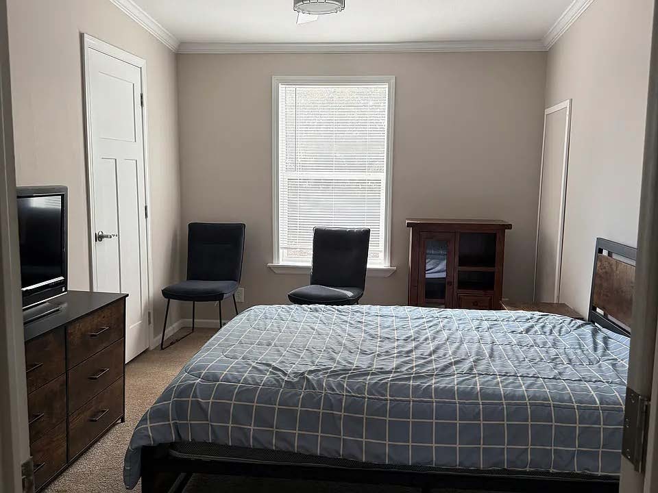 Bedroom at Elevate Hope Housing Tampa transitional home
